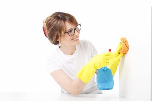 Local cleaner working in a Brent family home with stairs and living areas